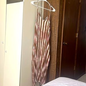 Like new condition! Fits like a large. Love this dress!!